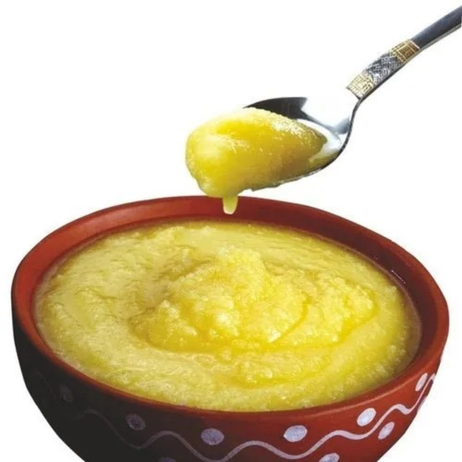 Nutrix Pure Desi Ghee in a bowl with a spoon, showcasing its rich texture and natural color.