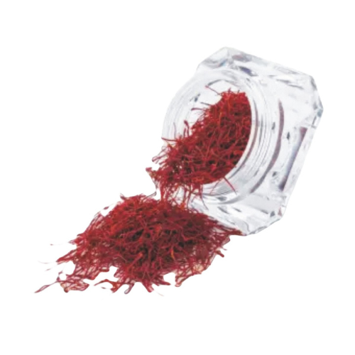 Premium Saffron in a glass jar with vibrant red threads spilling out, showcasing its rich color and aroma.