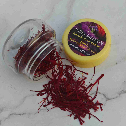 Premium Saffron in a jar showcasing high-quality, vibrant red threads for culinary and wellness use.